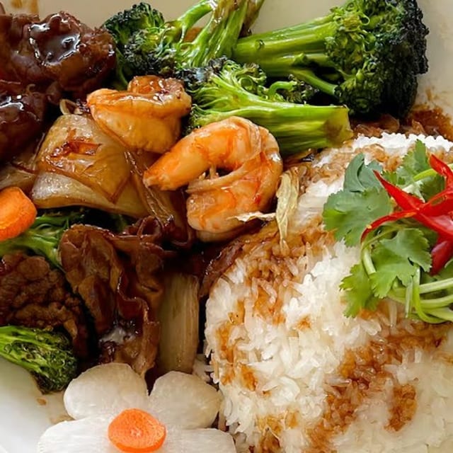 98. Com Tom Bo Xao Bong Cai.